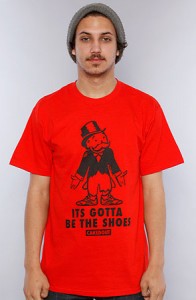The It's the Shoes Tee in Red. A Caked Out explanation on why most people are broke.
